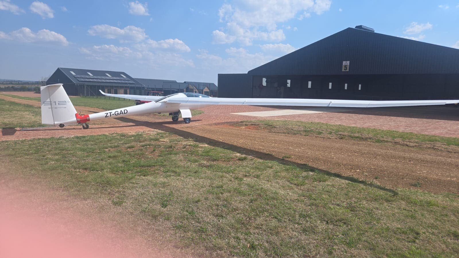 Stemme S12 ZT-GAD from the rear quarter on the apron