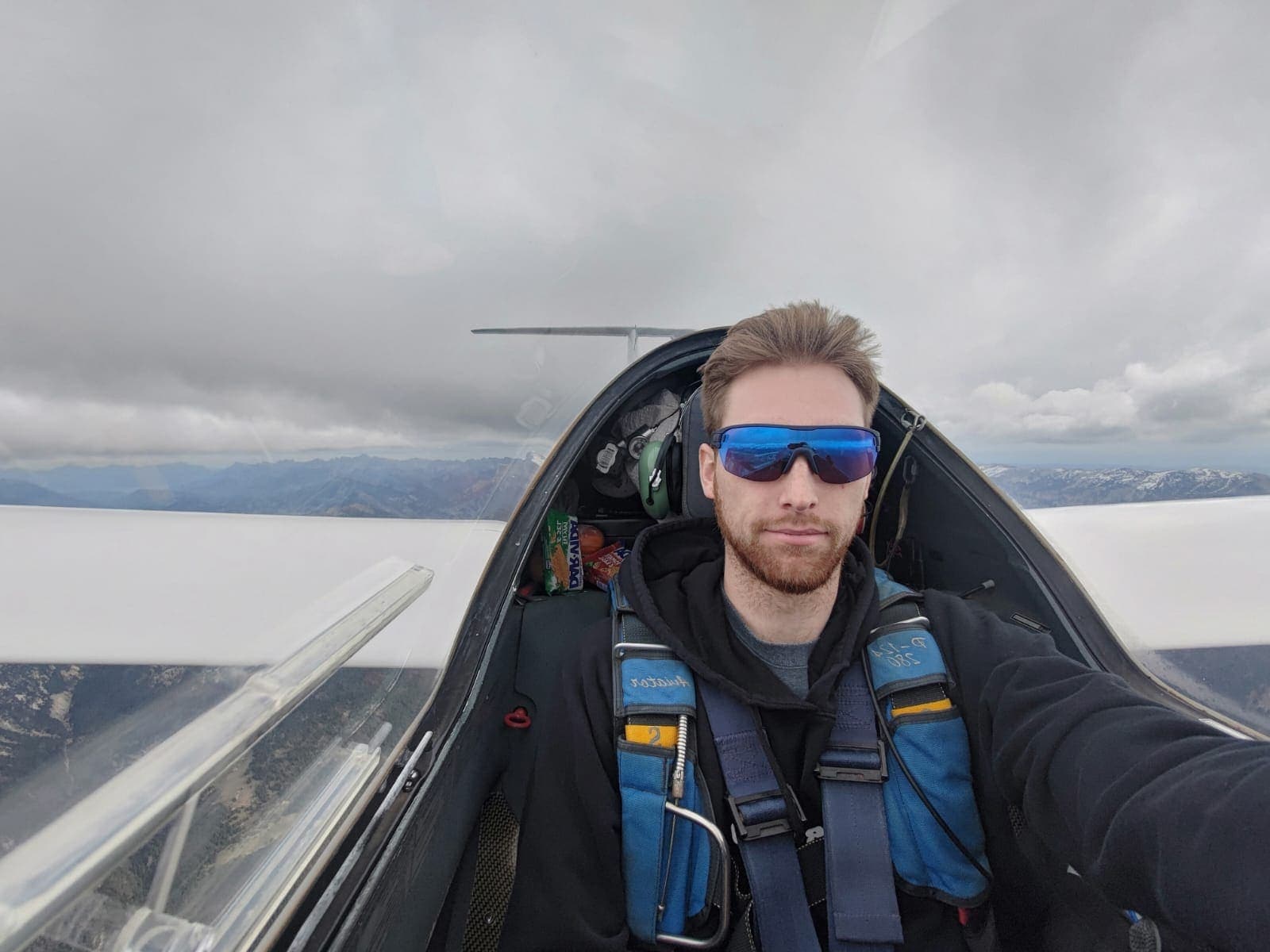 Remy Hirt at altitude in the cockpit of his glider over the Alps